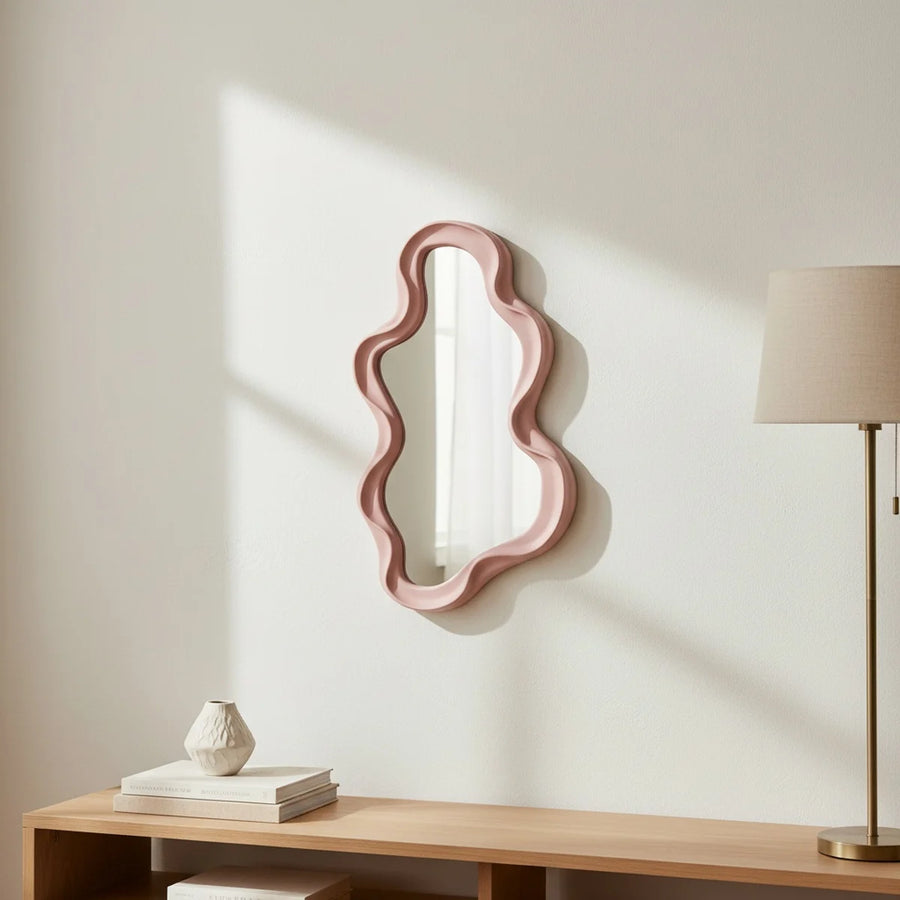 Small Pink Wavy Mirror, styled in a bright interior