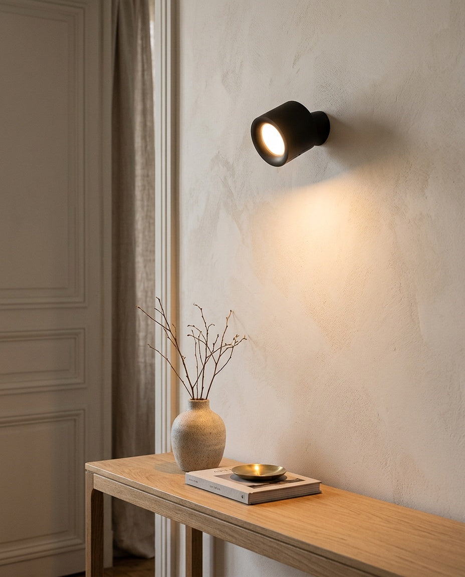 Wall sconces, styled in a room
