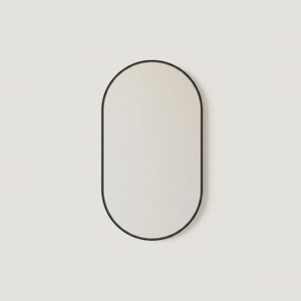 Black Oval Mirror, 20 x 31 in Aluminum Frame, on a light background