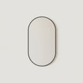 Black Oval Mirror, 20 x 31 in Aluminum Frame, on a light background