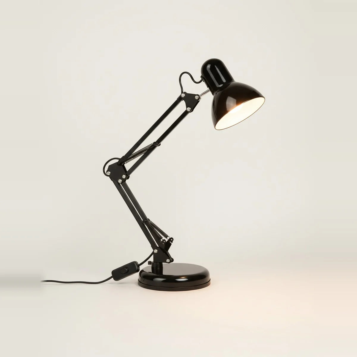 Swing Arm Lamp for Bedside Reading, Black, on a light background