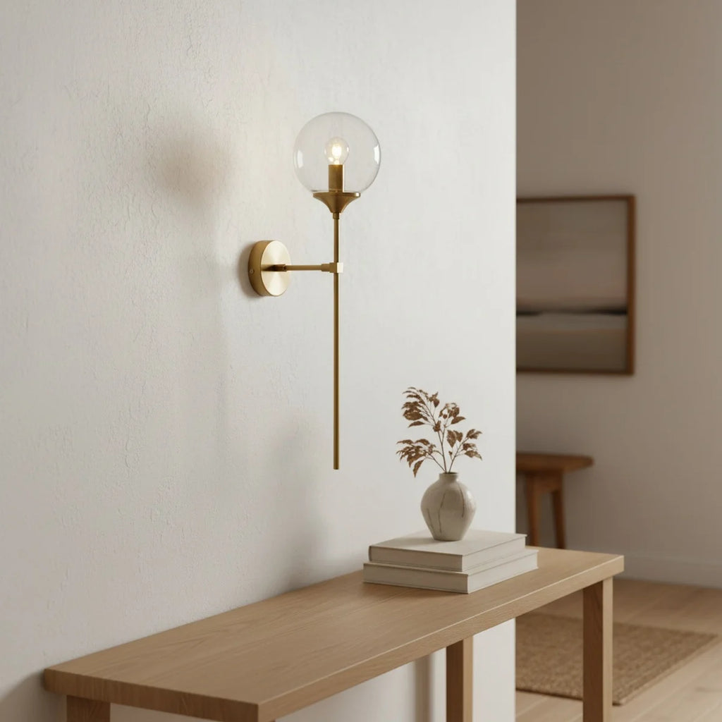 Brass Glass Wall Light, Gold Brass-Look Metal & Clear Glass, styled in a hallway