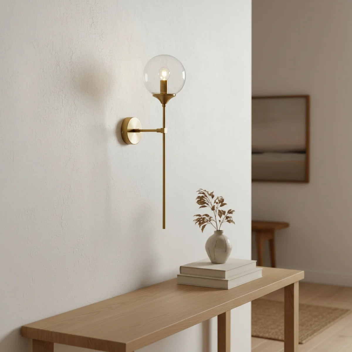 Brass Glass Wall Light, Gold Brass-Look Metal & Clear Glass, styled in a hallway