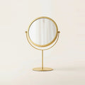 Gold Tabletop Mirror, Round and Double Sided, on a light background
