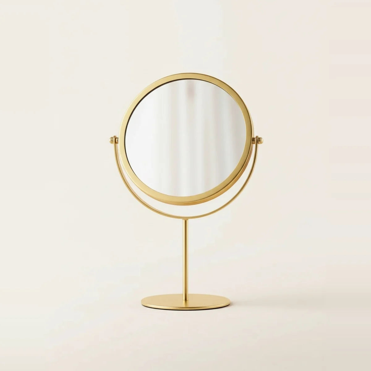 Gold Tabletop Mirror, Round and Double Sided, on a light background