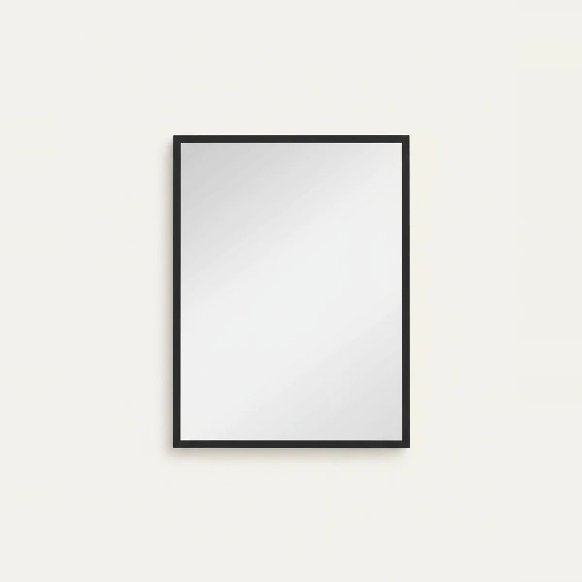 Black Industrial Mirror, 24 × 31.5 in Thin Frame, on a light background