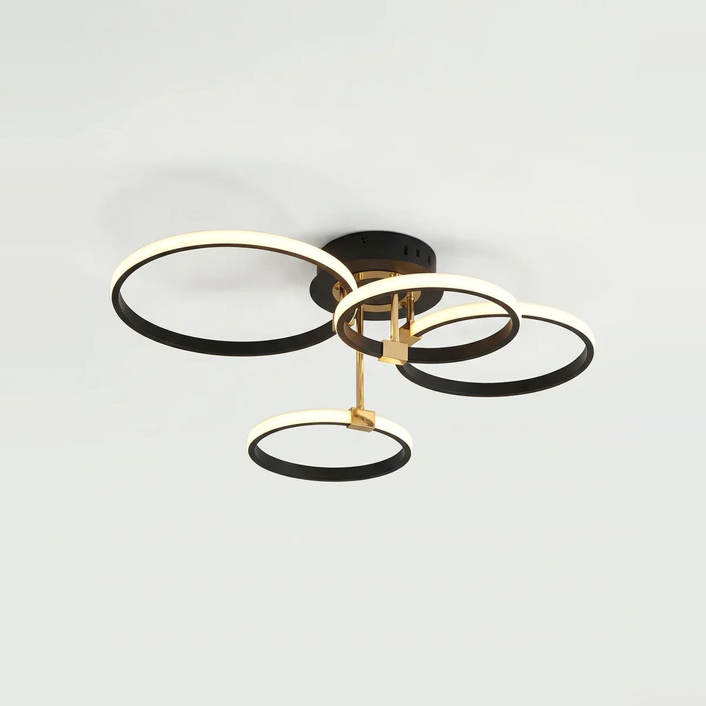 LED Ring Chandelier, 4 Black Rings, Dimmable with Remote, on a light background
