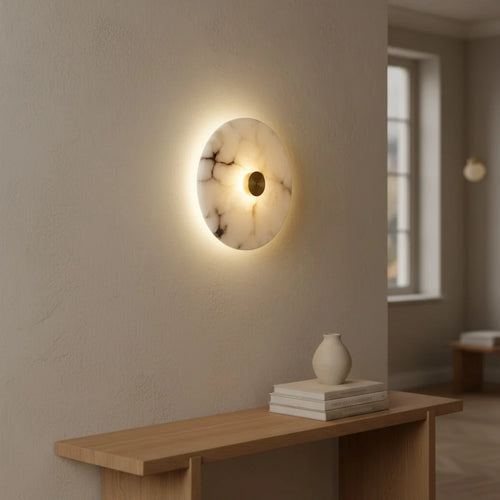 Art Deco Marble Sconce, Round with Brass, Warm LED, styled in a hallway