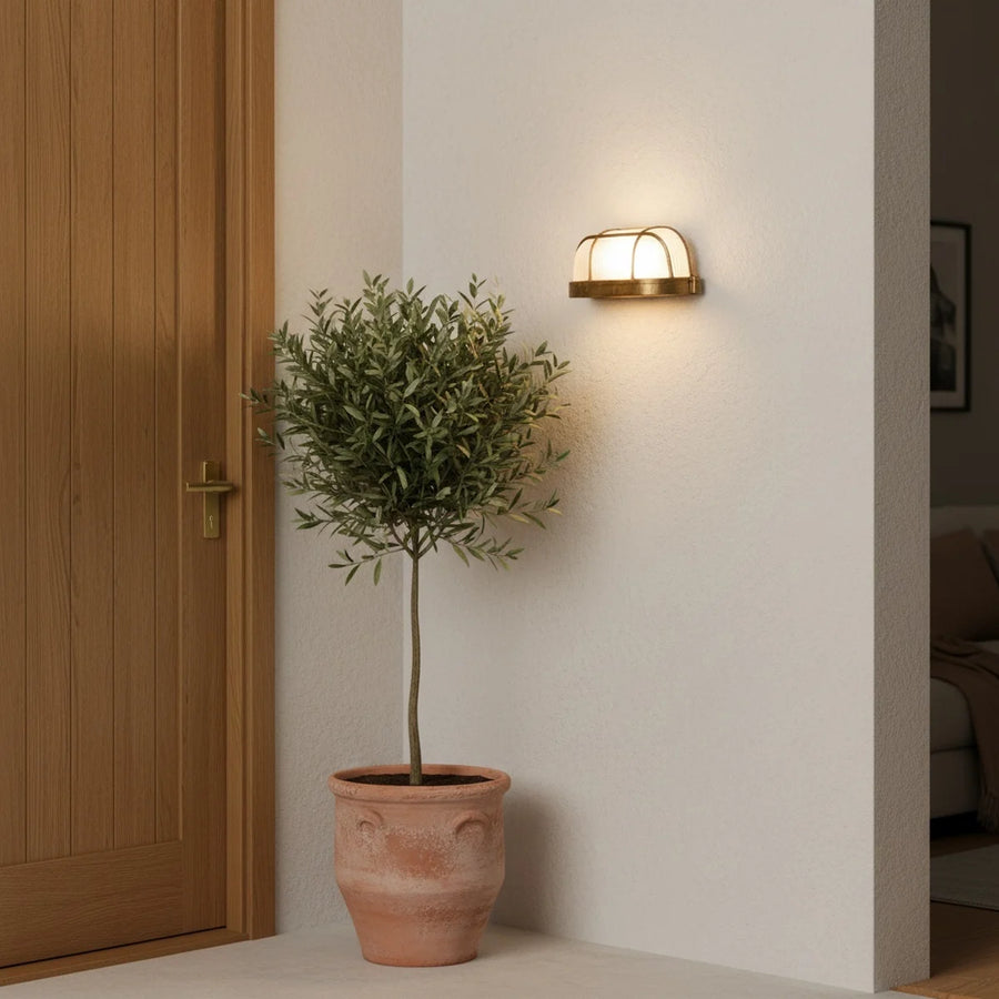 Gold Nautical Outdoor Wall Light, Porthole Style, Aluminum, IP54, styled on an exterior wall