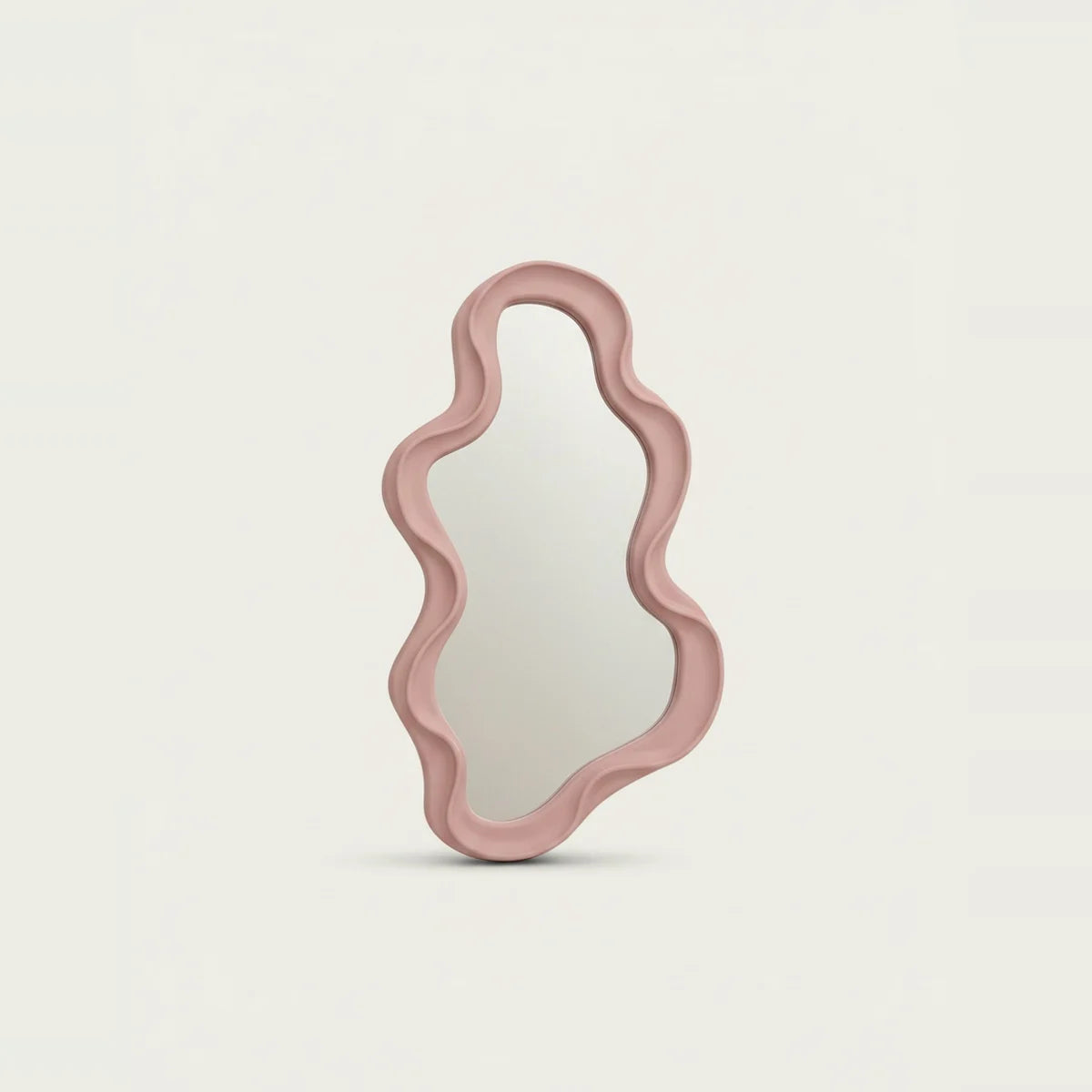 Small Pink Wavy Mirror, on a light background