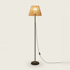Rattan Floor Lamp with Hand-Woven Shade, Black Base, 55 in, on a light background