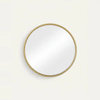 Round Gold Mirror, Thin Metal Frame, 16 to 24 in – Ø 16 in (40 cm), on a light background