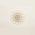 Small Rattan Mirror, Round and Handwoven, on a light background