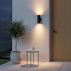 Black Stainless Steel Up Down Outdoor Wall Light, GU10, IP65, styled on an exterior wall