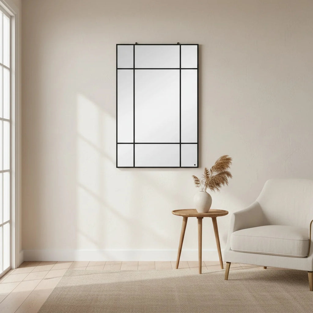 Miroir verrière noir style fenêtre 90 × 60 cm en métal, mise en situation dans un intérieur lumineux