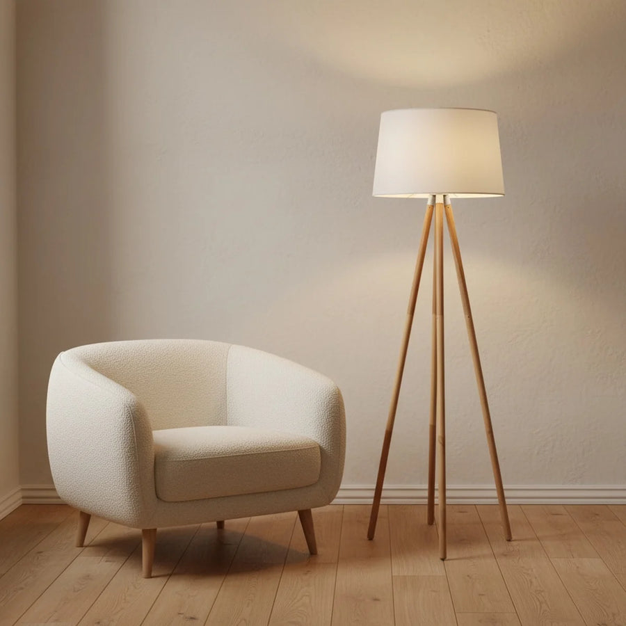 Wooden Tripod Floor Lamp with White Fabric Shade, styled in a living room