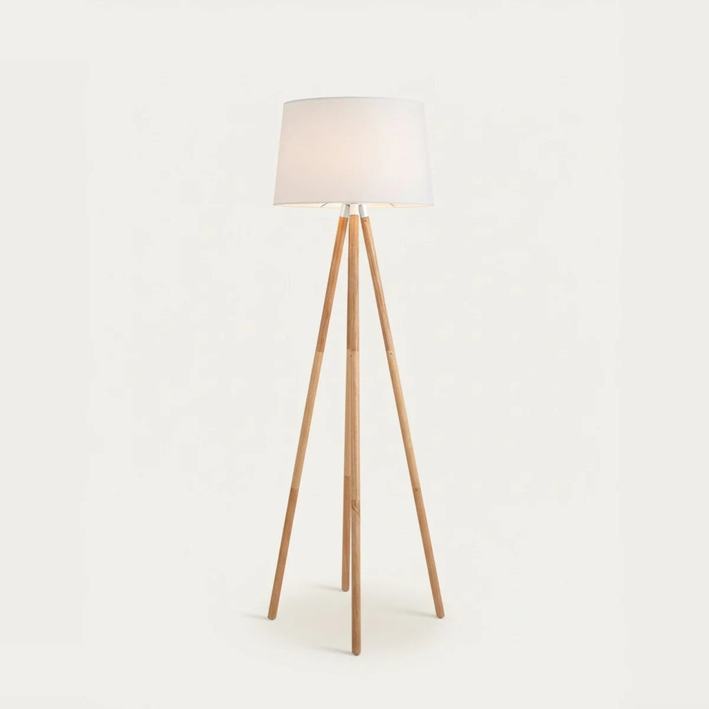 Wooden Tripod Floor Lamp with White Fabric Shade, on a light background