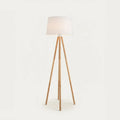 Wooden Tripod Floor Lamp with White Fabric Shade, on a light background